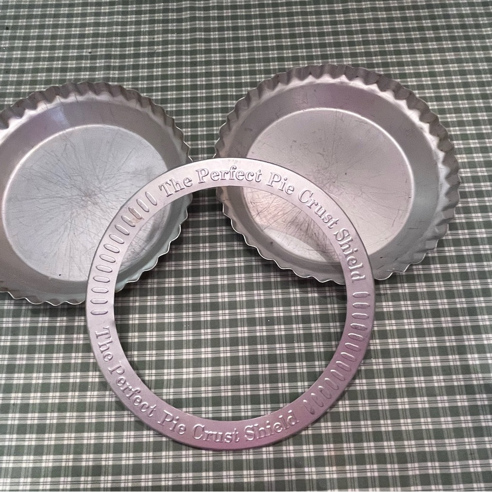 Two pie plates and cover